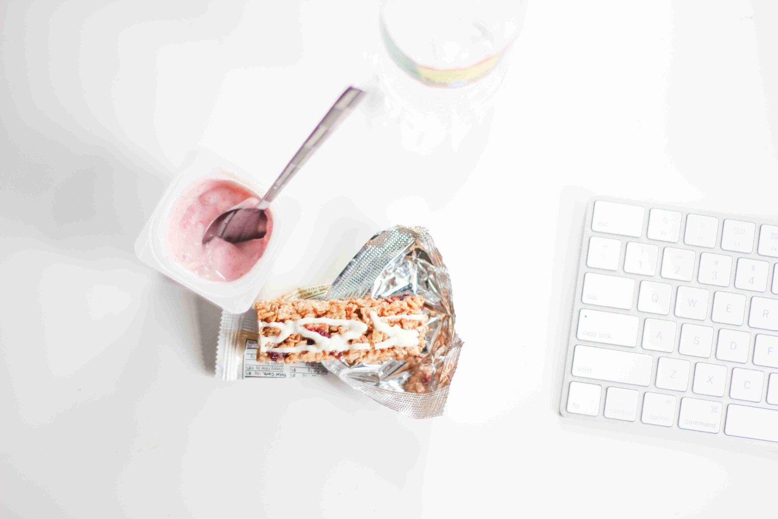 Meal prep containers filled with healthy snacks for work.